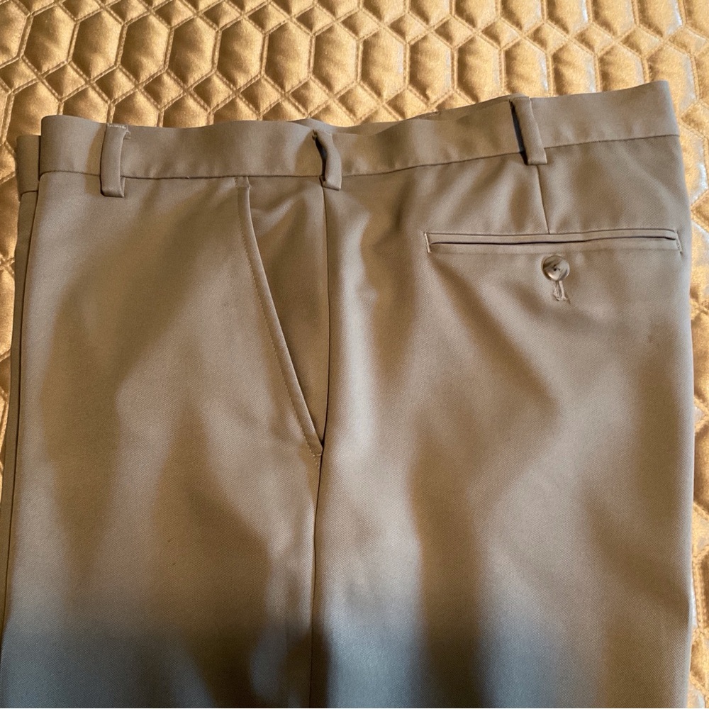 Tan Van-Heusen traveler flat front chinos  38W - 32L.